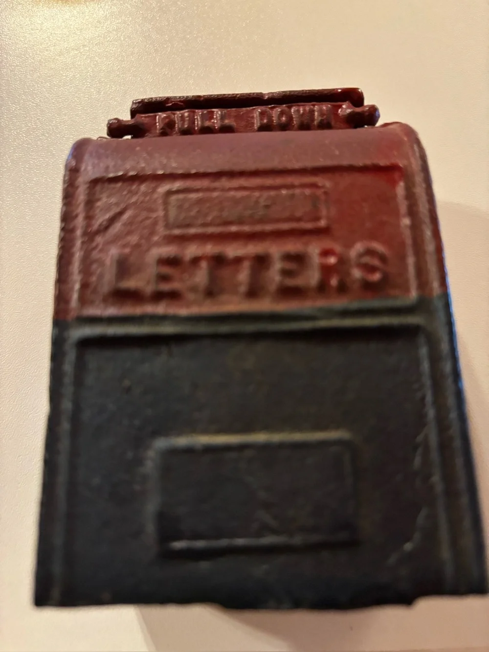 Cast iron stamp roll dispenser